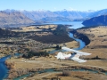 Waco over the Clutha River heading towards the lake